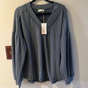 New in NWT denim blue color V neck top